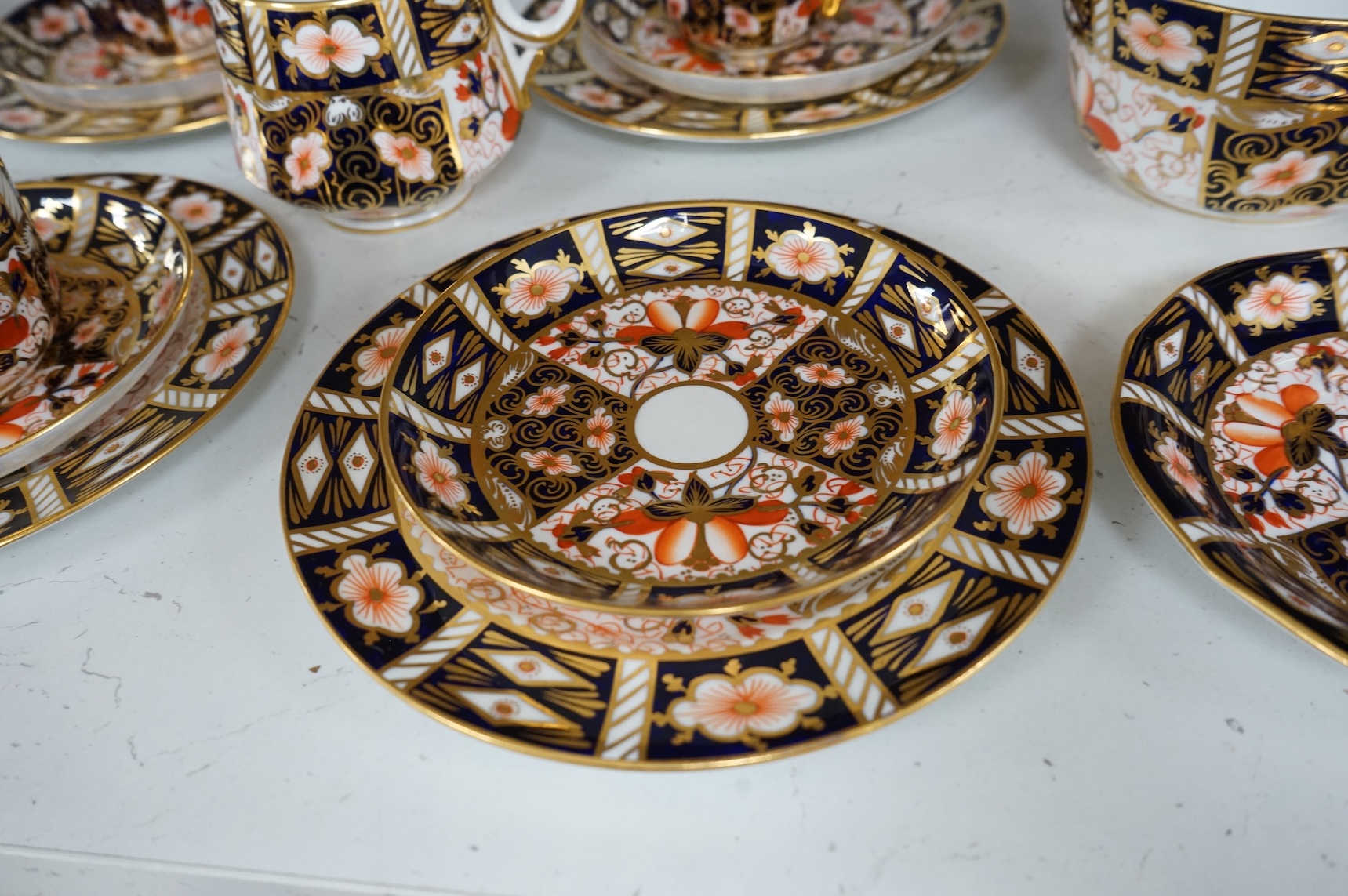 A Royal Crown Derby Imari pattern part tea service to include trios, bowl and jug